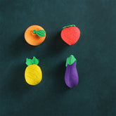 Set of 4 colorful 3D fruit and vegetable erasers for kids from Writezo.