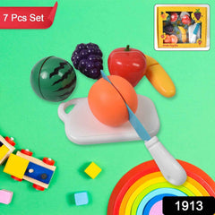 Complete 7-piece fruit cutting toy set including a safe play knife and chopping board.
