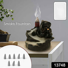 Close-up of Ganesha Smoke Fountain Idol, intricately designed poly resin.