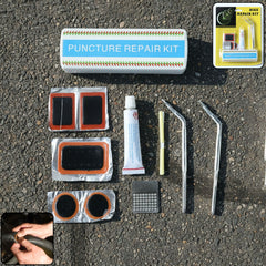 Portable bicycle tire repair kit with patches, adhesive, and tools in compact case