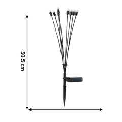 Ground stake solar LED garden light installed in lawn