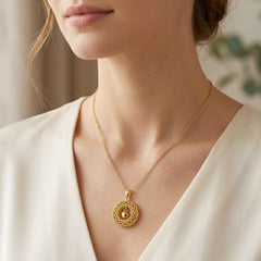 Golden Necklace with Intricate Round Pendant – Elegant Jewelry