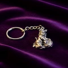 Bal Krishna Makhan Chor keychain attached to a set of everyday keys
