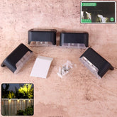 Main view of 4-piece Garden Vera solar stair lights, showing their compact design.