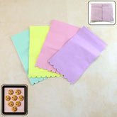 Multicolor decorative baking paper sheets in assorted pastel colors.