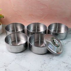 Closed stainless steel lunch box showing its sleek, round design.