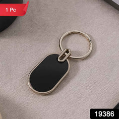 Oval Metal Keychain – Elegant Black & Silver Finish for Everyday Use
