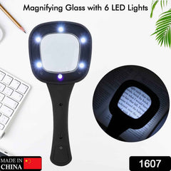 Lighted magnifier used for precision soldering and electronic inspection.
