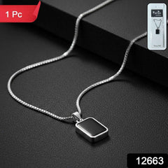 Close-up of men's pendant chain with black rectangular stainless-steel pendant