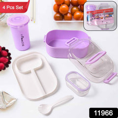 Lunch box set displaying multiple food compartments and included utensils