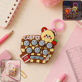 Unicorn fidget popper keychain toy with nine popper bubbles attached to a clip