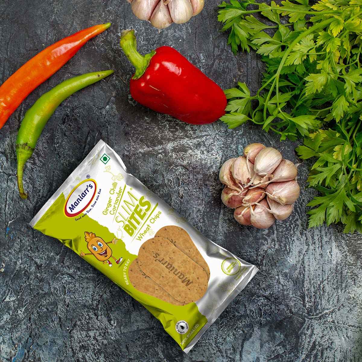 Maniarr's Ginger Chilli Khakhra wheat chips, 58g pack, garnished with fresh coriander.