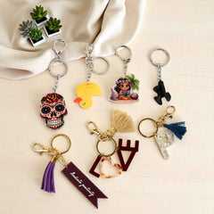Assorted designer keychain with animal theme in acrylic and metal
