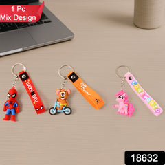 Close-up of a cute 3D cartoon silicone keychain with a metal hook and strap.