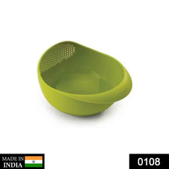 Top-down view of a spacious plastic rice bowl strainer ready for use.