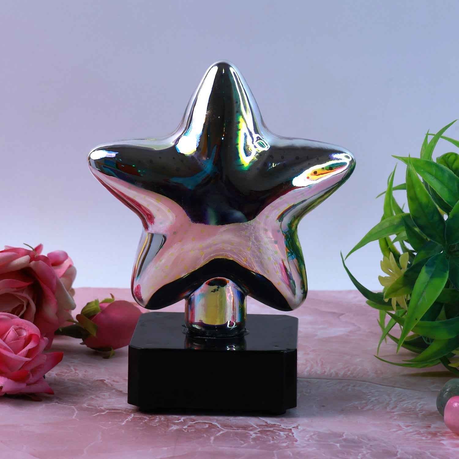 Tranquil star shaped LED night lamp emitting colorful mood lighting