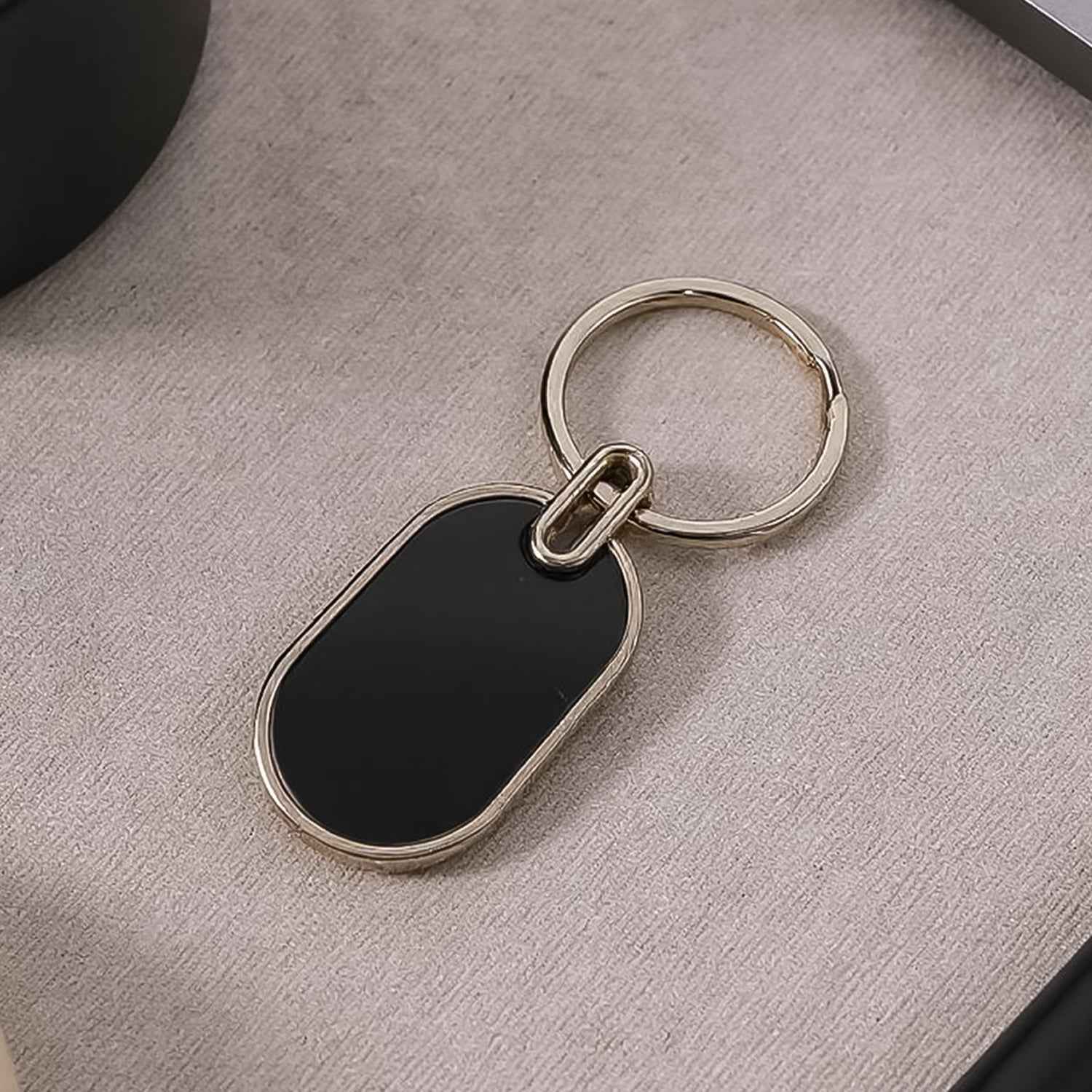 Oval Metal Keychain – Elegant Black & Silver Finish for Everyday Use