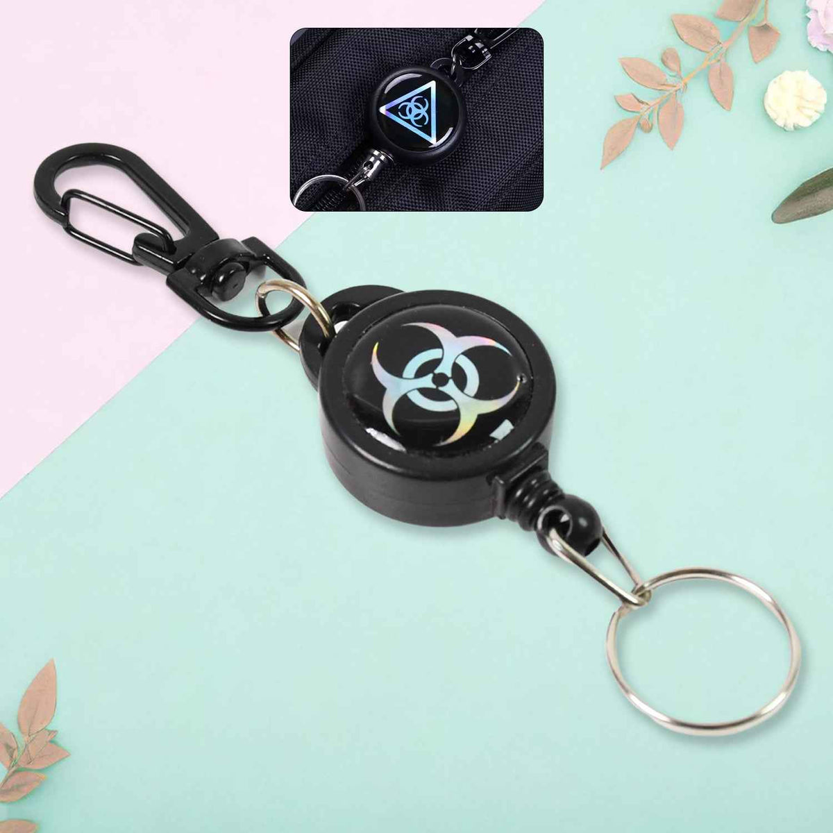 Durable retractable key chain with steel wire, shown ready for attachment.