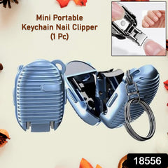 Compact keychain nail clipper attached to a set of keys for portability.