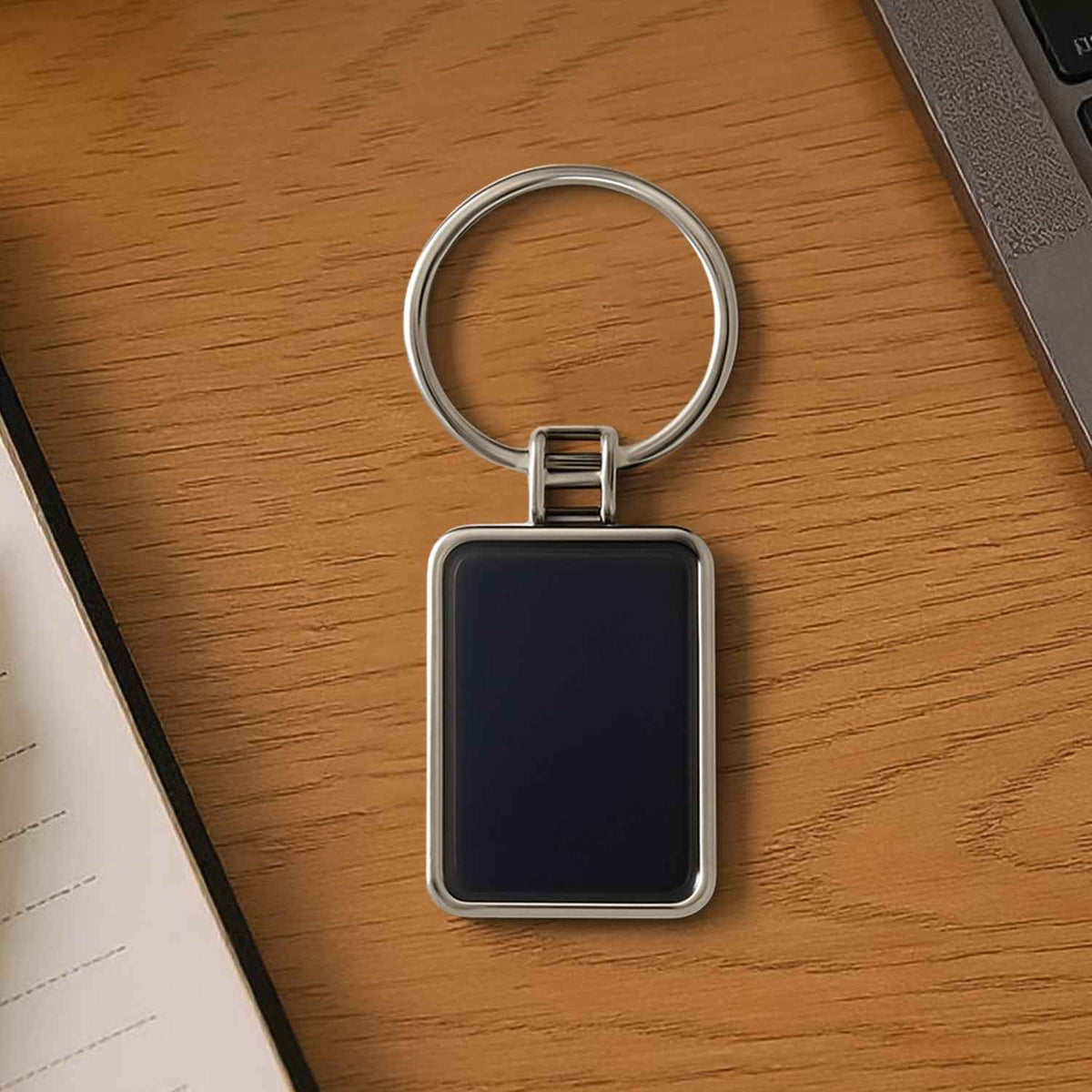 Premium rectangular black and silver metal keychain with glossy finish