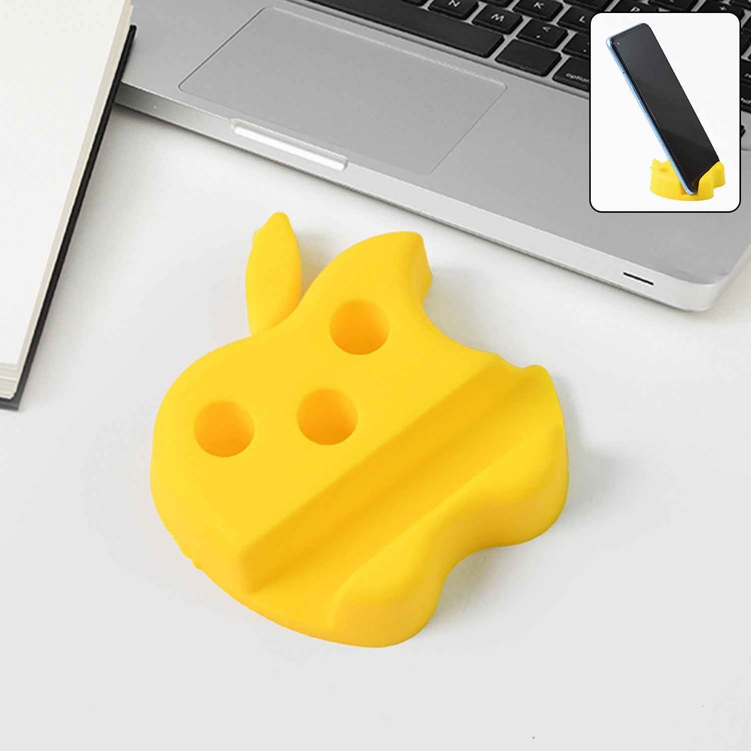 Multi-functional apple shape phone stand with pen holder on workspace
