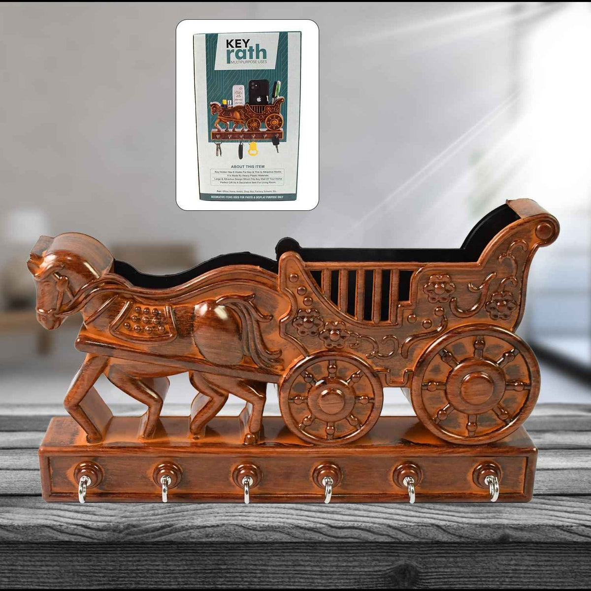 Decorative Rath wall key holder with 6 hooks, ideal for an Indian home entryway.