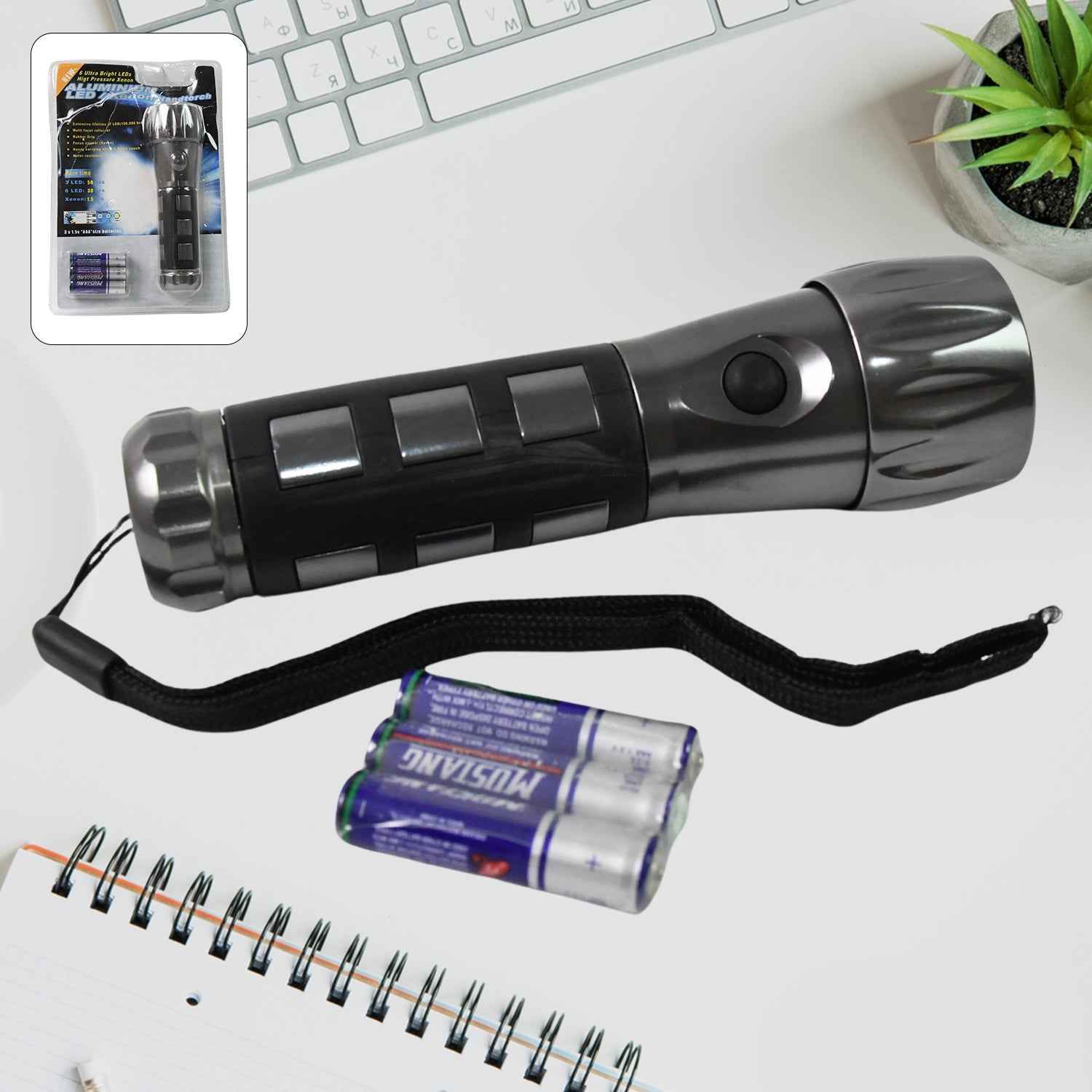 Aluminium LED Hand Torch with rubber grip, ready for use.