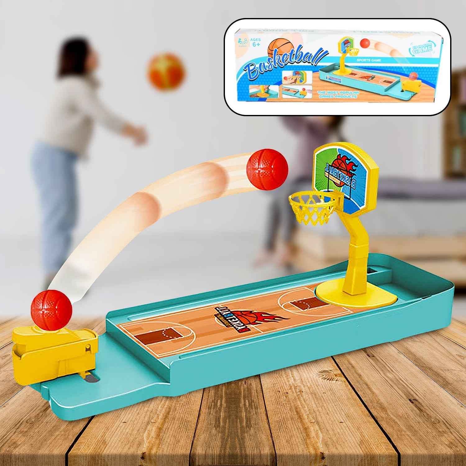 Close-up of the mini basketball hoop and launcher for the desktop game.