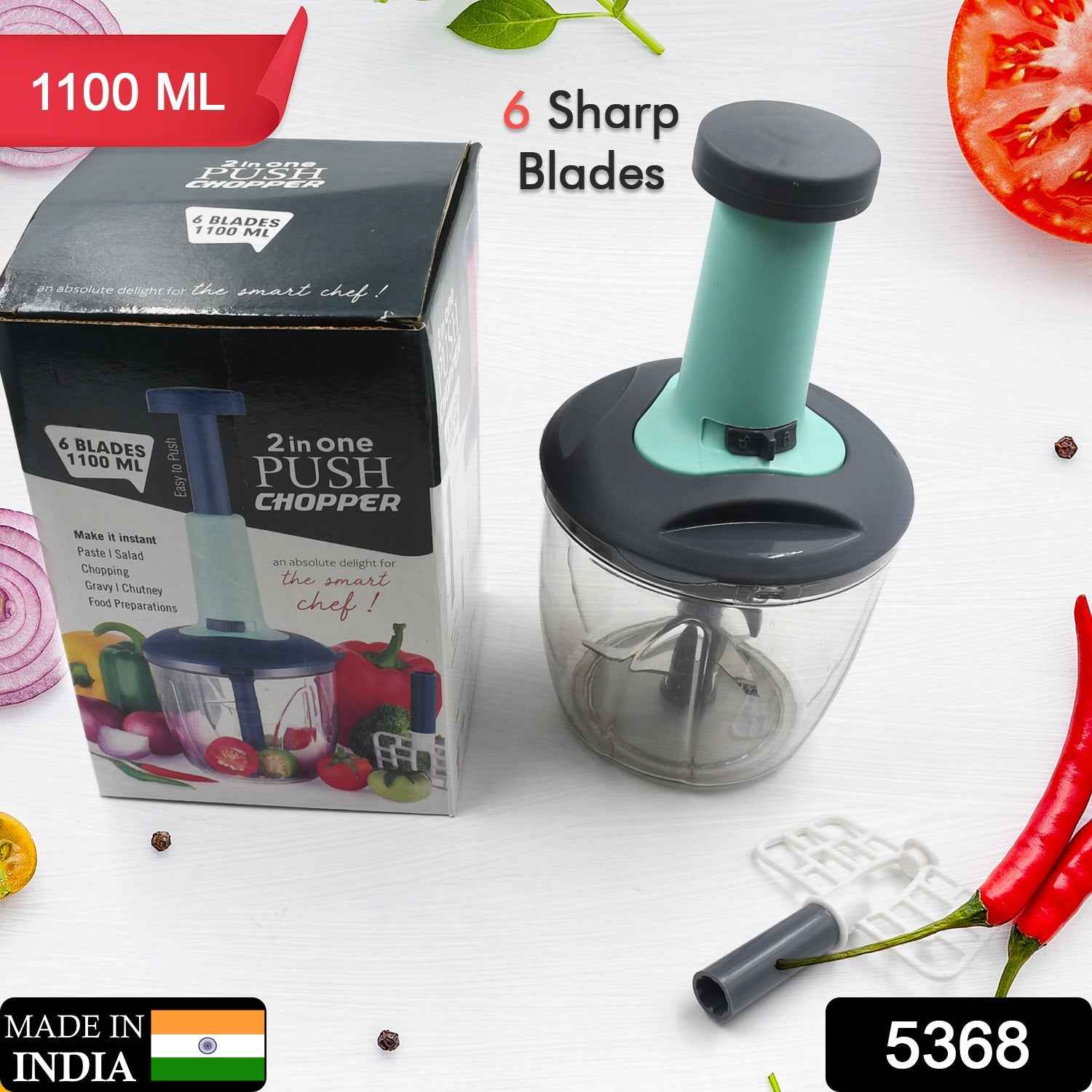 User demonstrating the easy push-up action of the manual vegetable chopper.