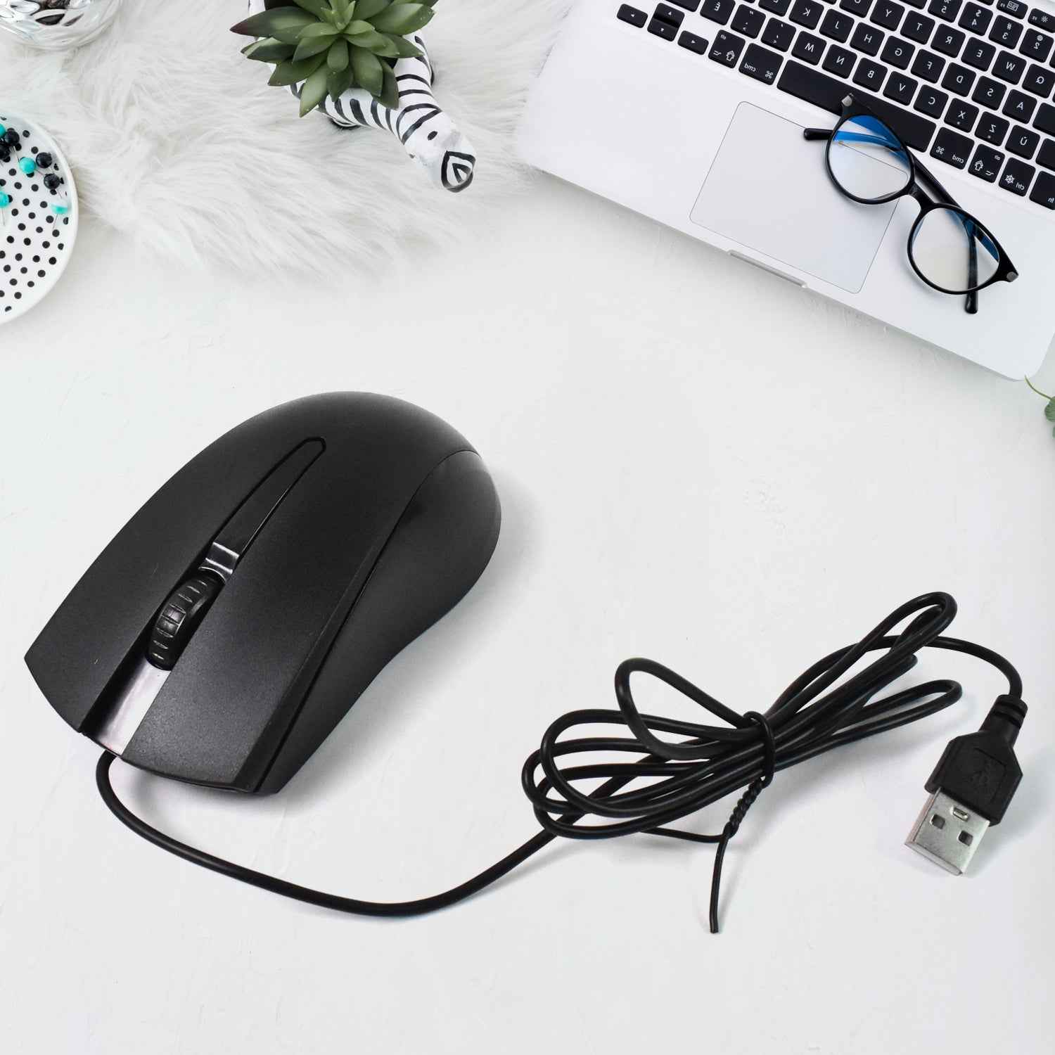 Compshop X2 Wired Optical Mouse with its sleek design on a clean white background.