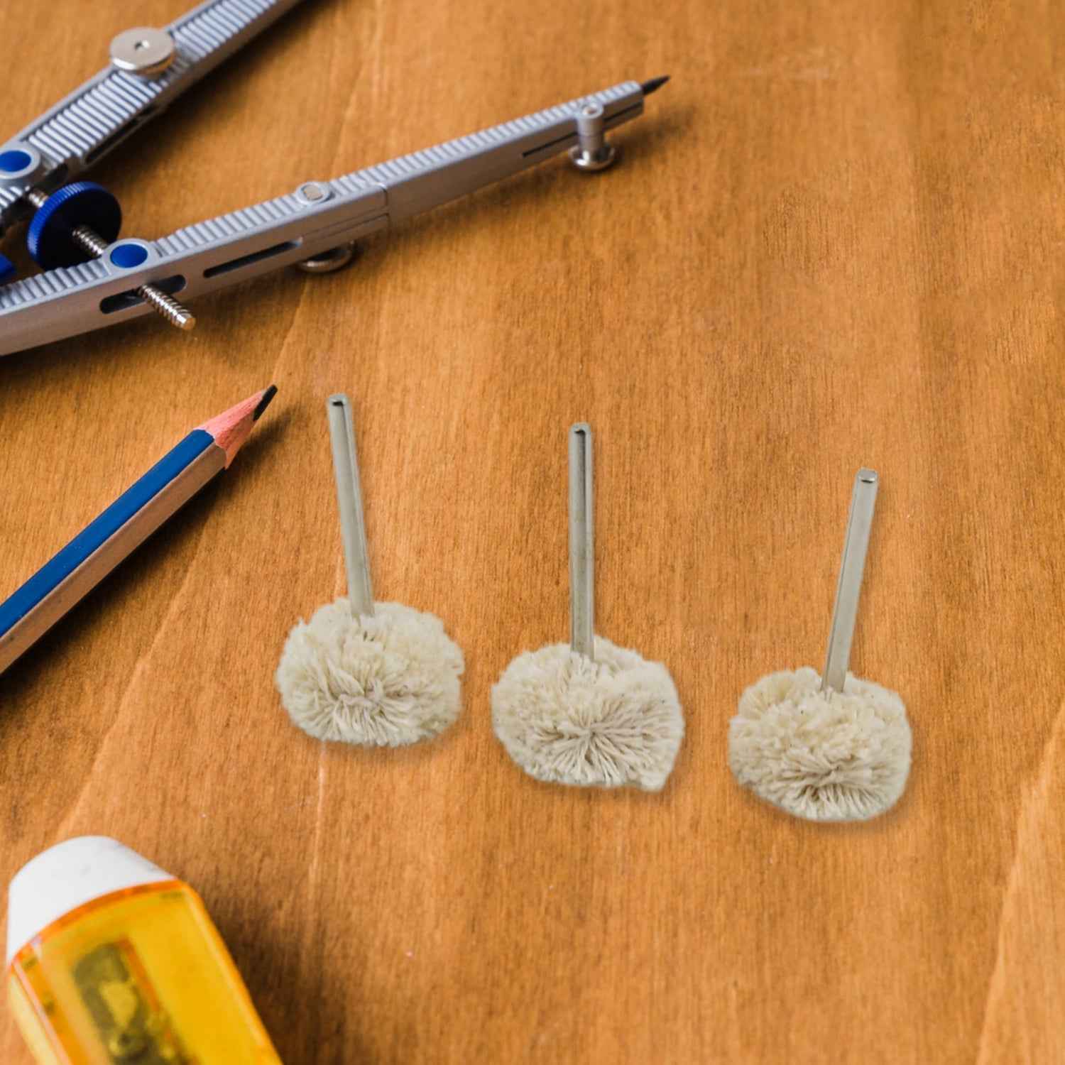 The 3-piece cotton polishing wheel set, ready for use with your Dremel polishing kit.