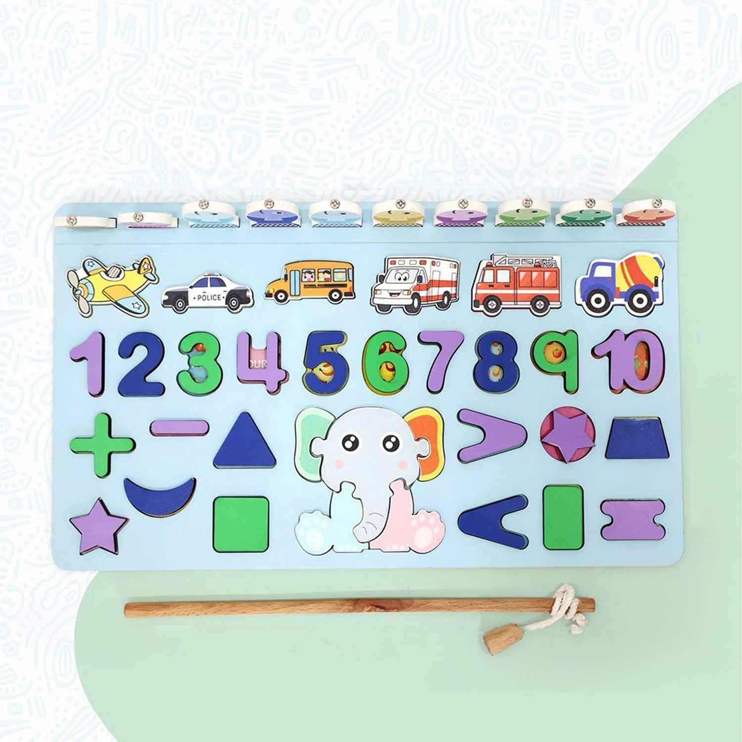 Detailed view of the magnetic rod and wooden number pieces of the puzzle.