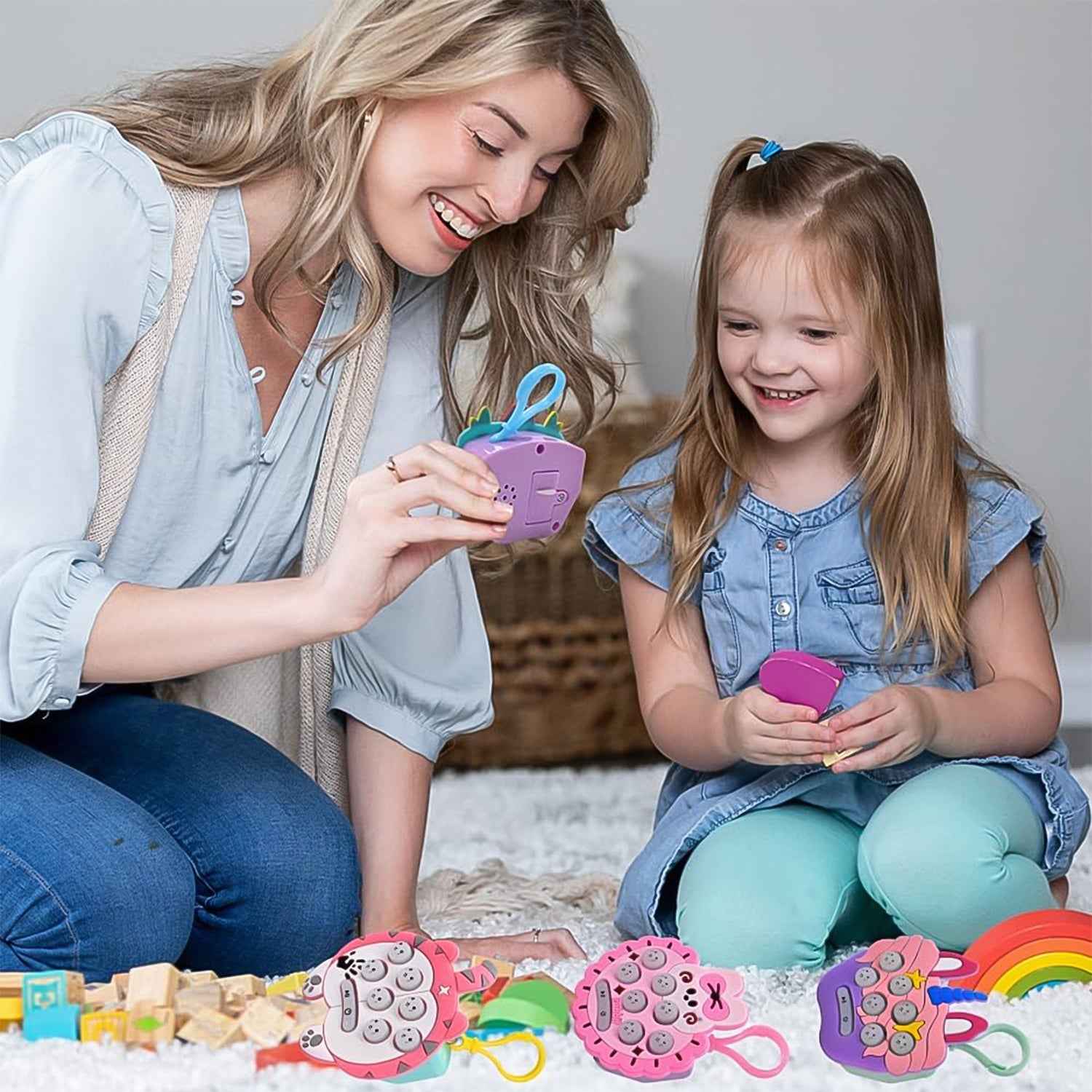 Mini Push Bubbles Game keychain attached to a backpack, ready for on-the-go play.