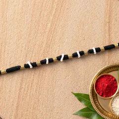 Handmade Pearl Beaded Rakhi Ð Traditional Ethnic Thread for Festivities