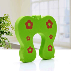 Soft animal-themed door guard for kids, ensuring child door safety.