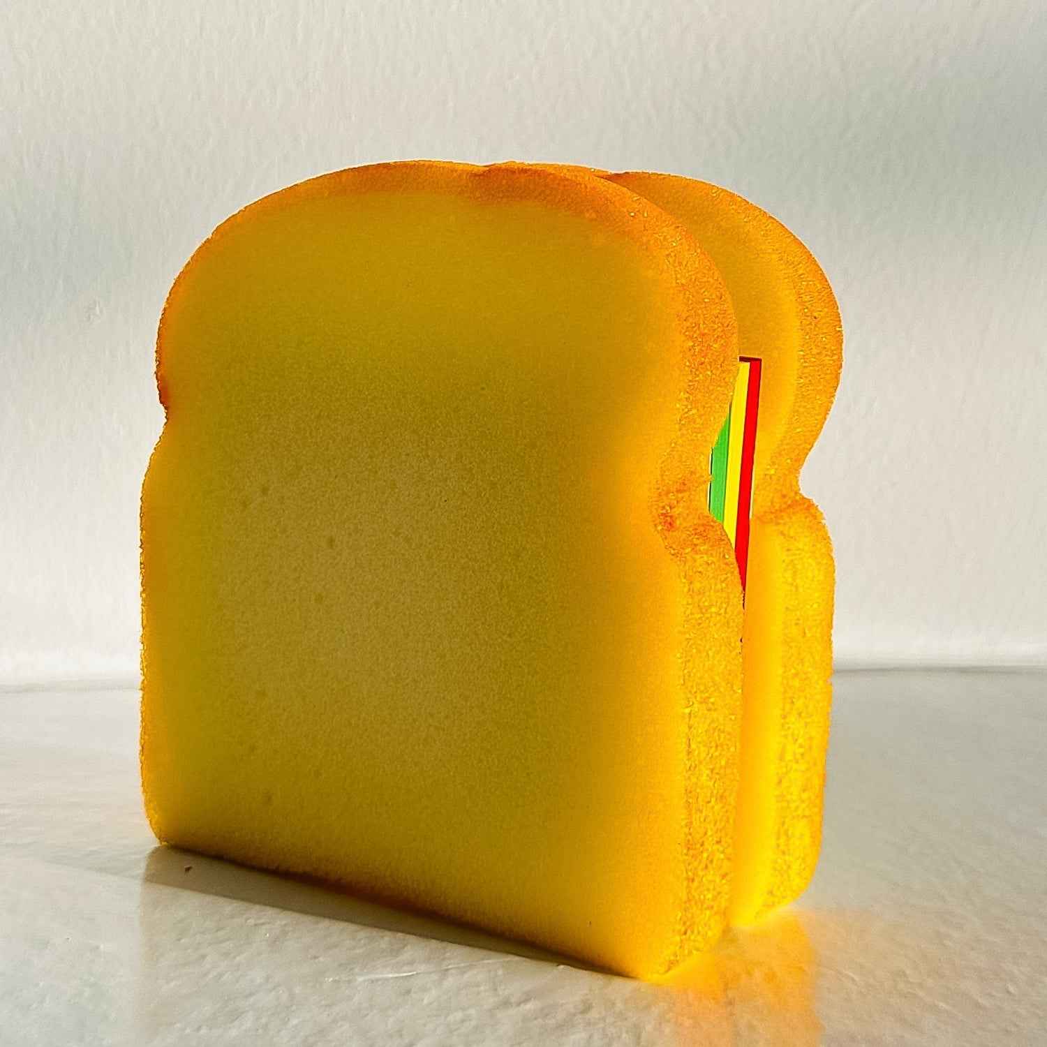 Side view of the unique sandwich-shaped memo notes stacked neatly.