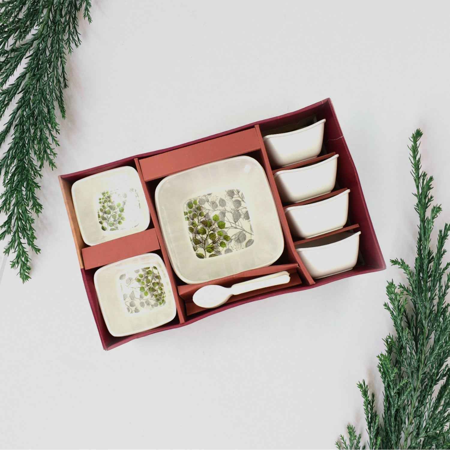 A shiny 13-piece Pudding Serving Set neatly arranged on a white background.