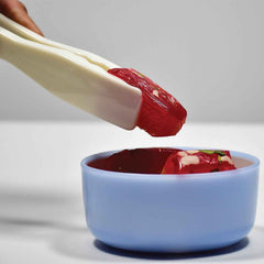 Food-grade plastic kitchen tongs with bread clamps for versatile cooking.