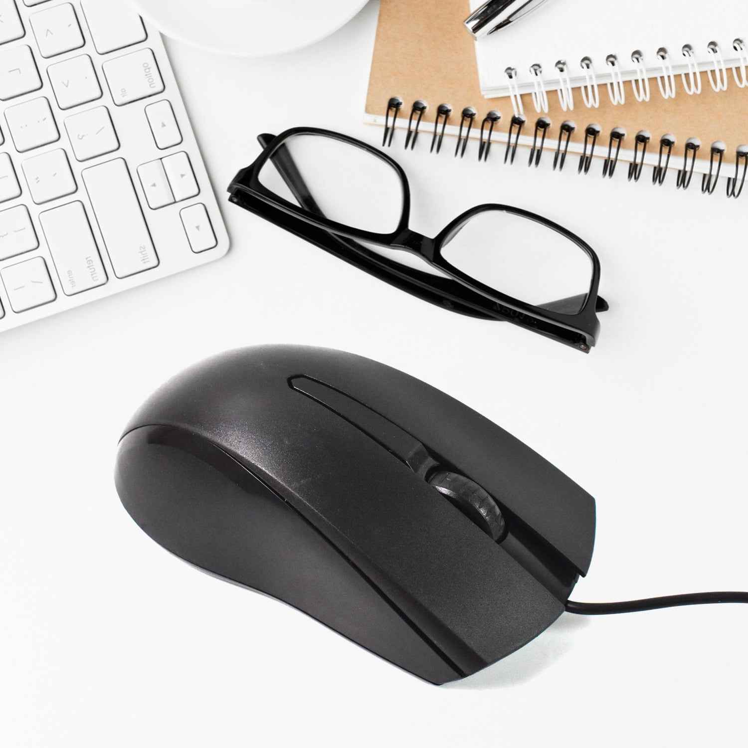 Top-down view of the X2 Wired Optical Mouse, showing its scroll wheel and buttons.