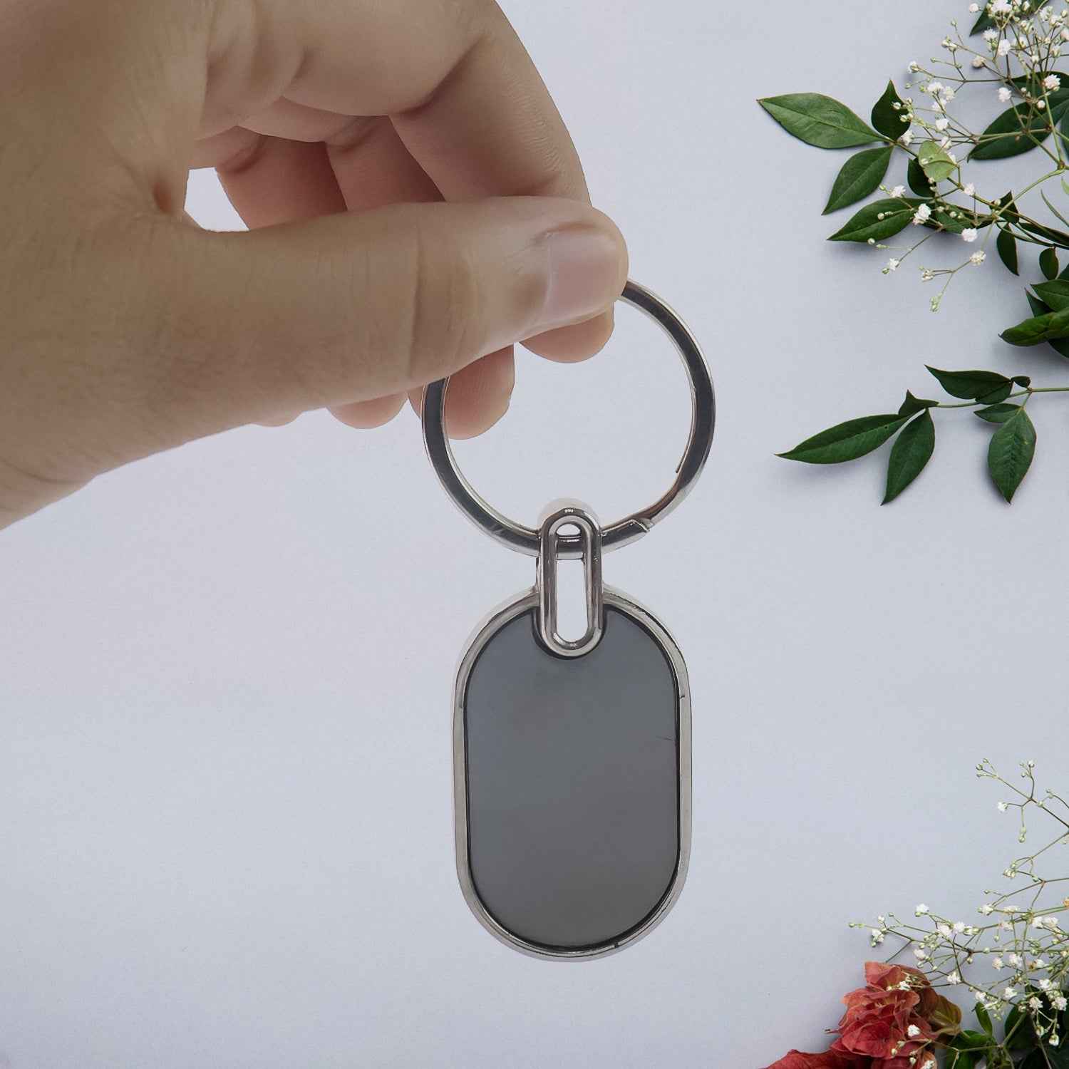 Oval Metal Keychain – Elegant Black & Silver Finish for Everyday Use