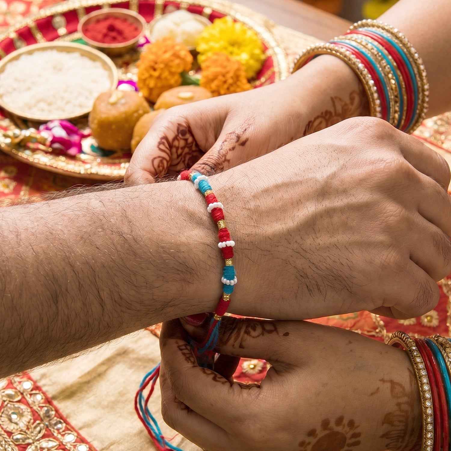 Handmade Pearl Beaded Rakhi Ð Elegant Traditional Gifting