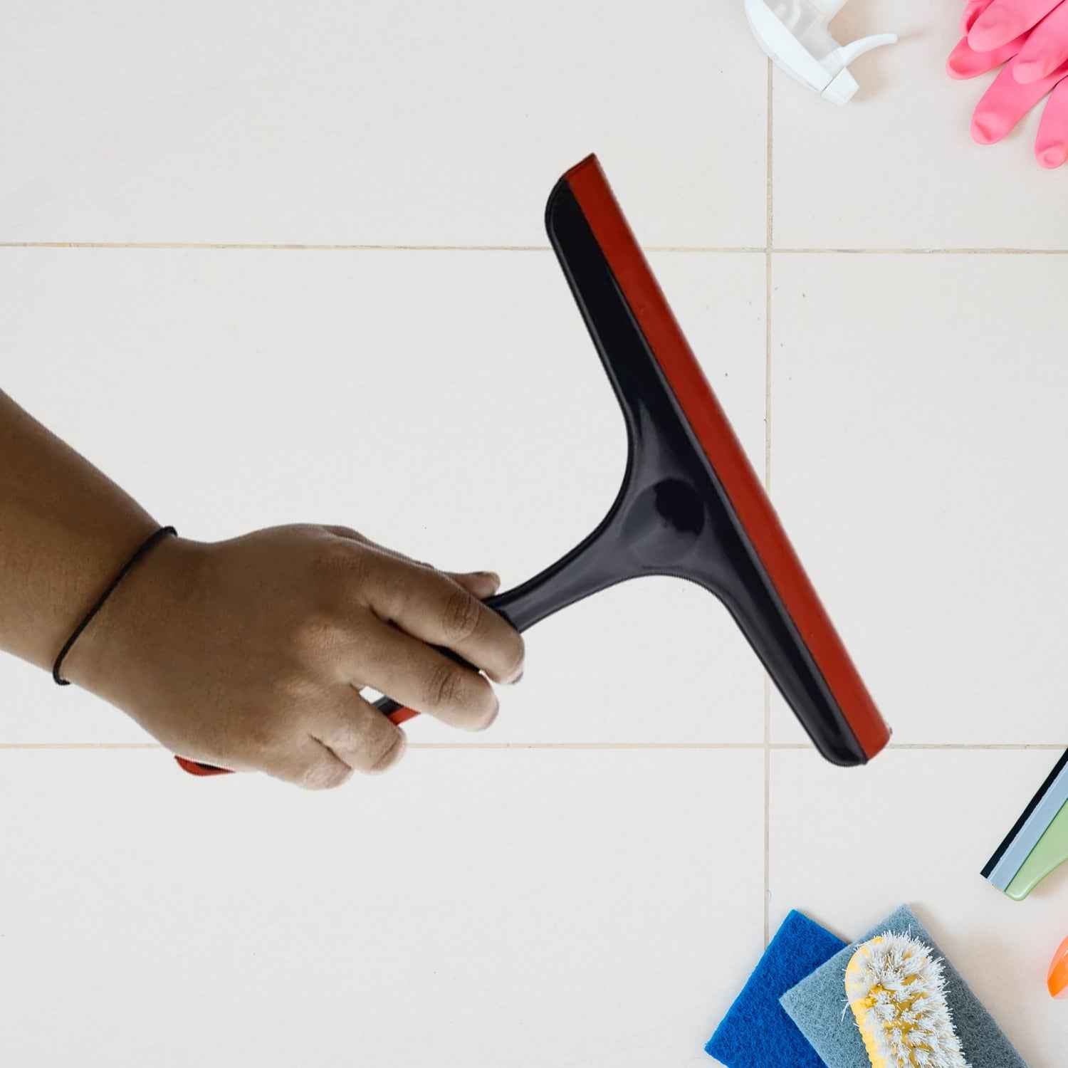 Sturdy plastic handle of the kitchen wiper with a convenient hanging provision for storage.