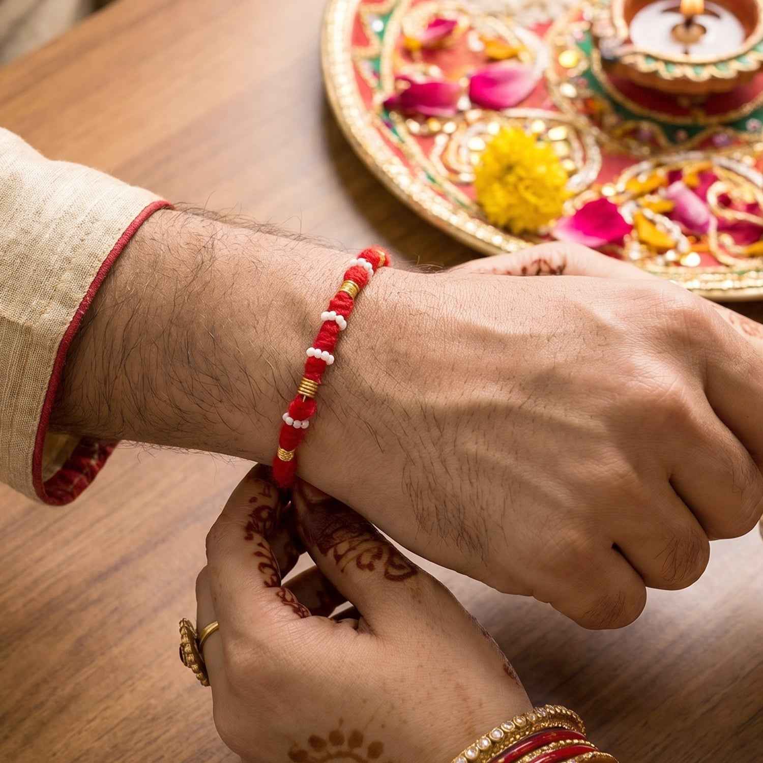 Handmade Red Rakhi with White Beads Ð Traditional Celebration Accessory