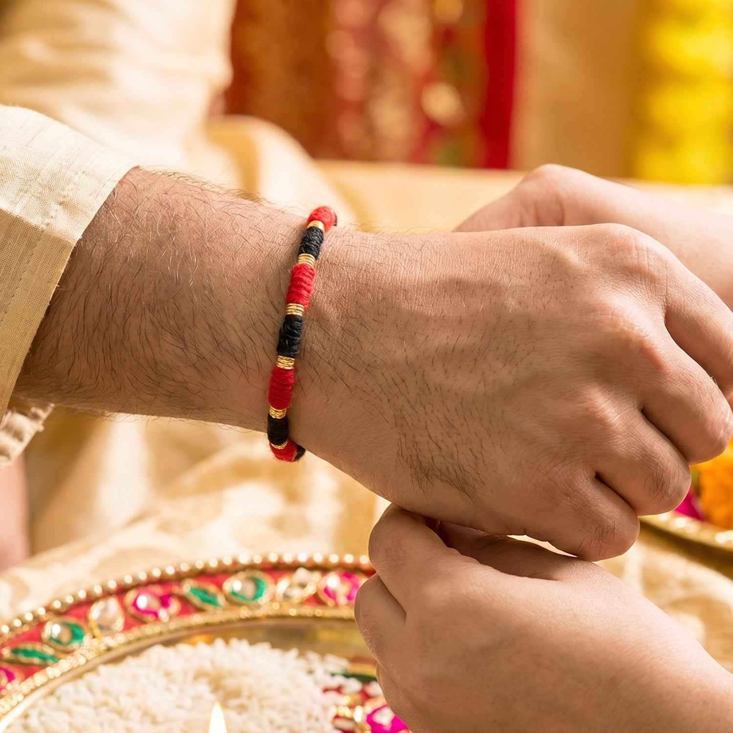 Handmade Rakhi Ð Traditional Beaded Thread with Golden Accents