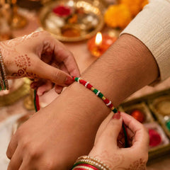 Designer Rakhi Ð Handmade with Golden Beads & Ethnic Threads