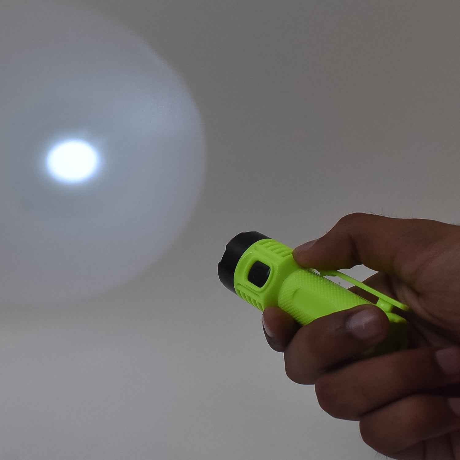 Close-up image of USB charging port on LED flashlight torch