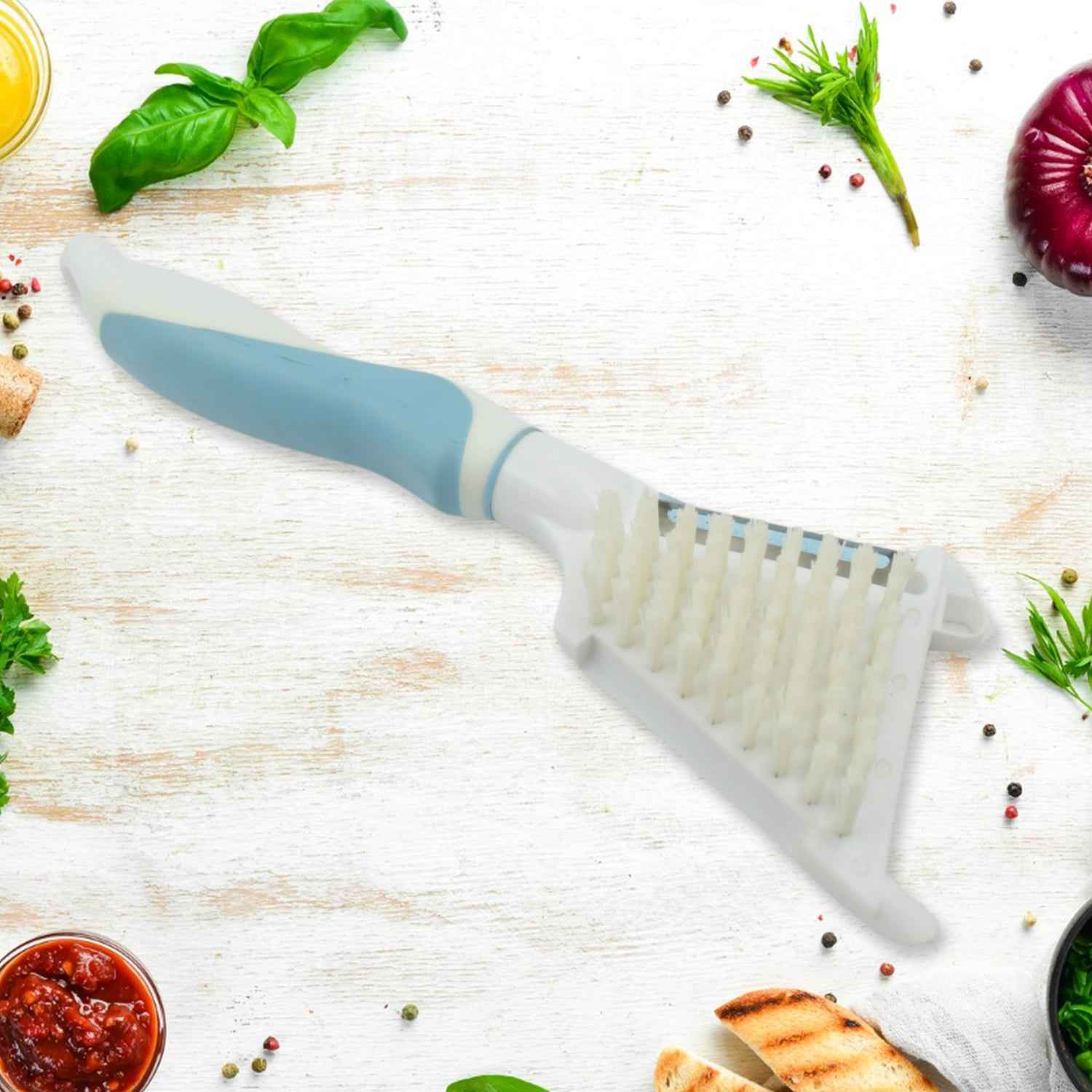 Side view of the stainless steel peeler brush, highlighting its compact design.