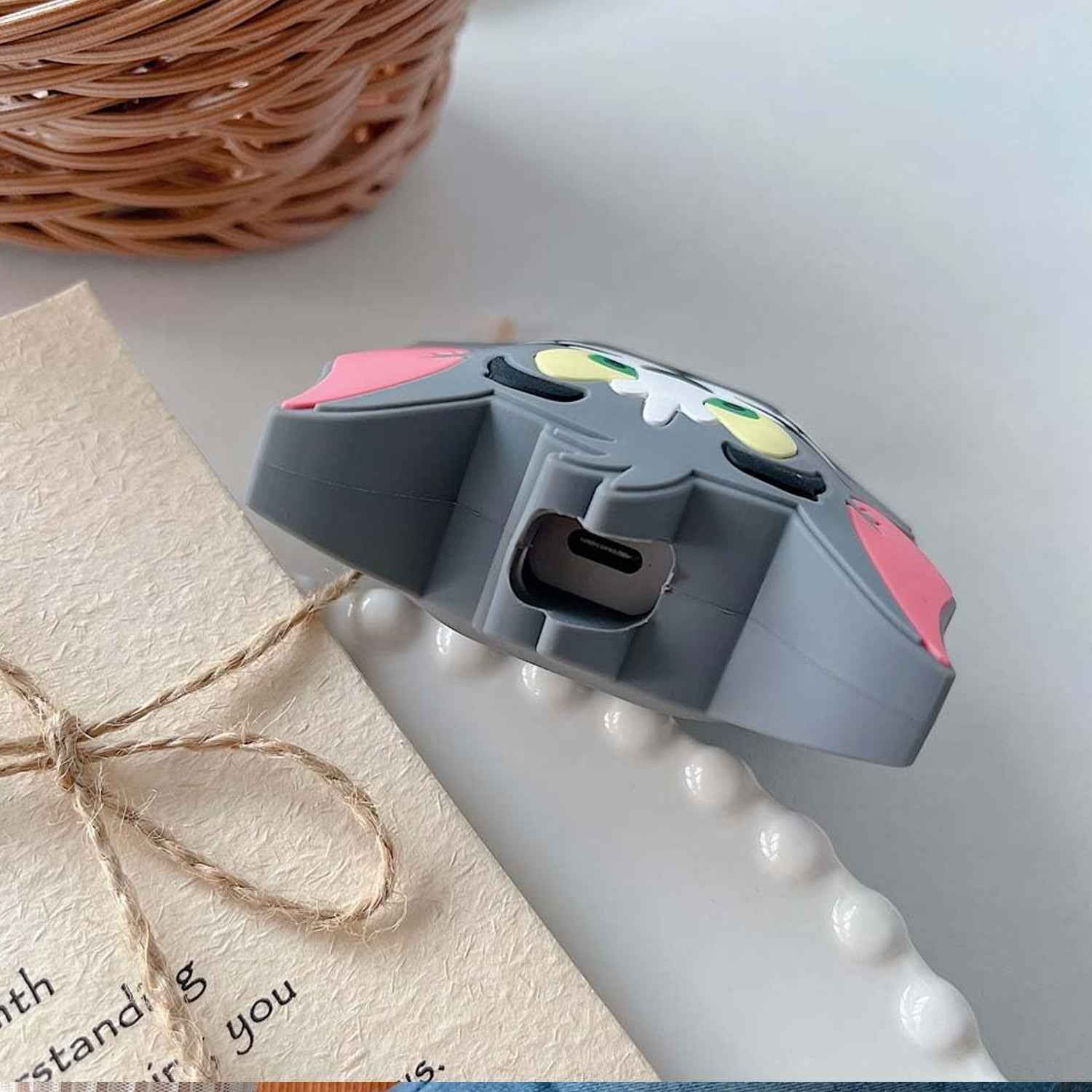 Close-up of a vibrant silicon charger protector for Apple iPhone.