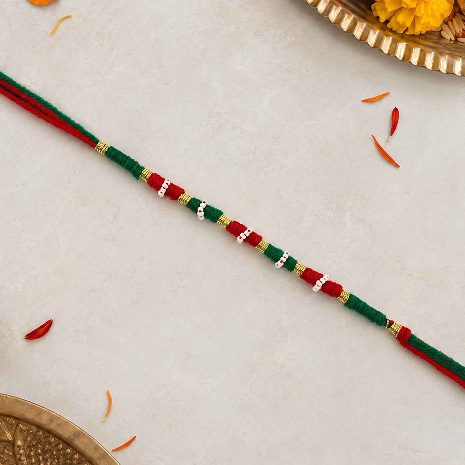 Designer Rakhi Ð Handmade with Golden Beads & Ethnic Threads