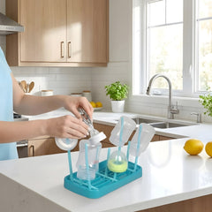 Bottle holder drying rack neatly organizes baby feeding bottles and nipples